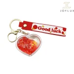 جاکلیدی آکواریومی قلبیشکل با بند قرمز و نوشته Good Luck